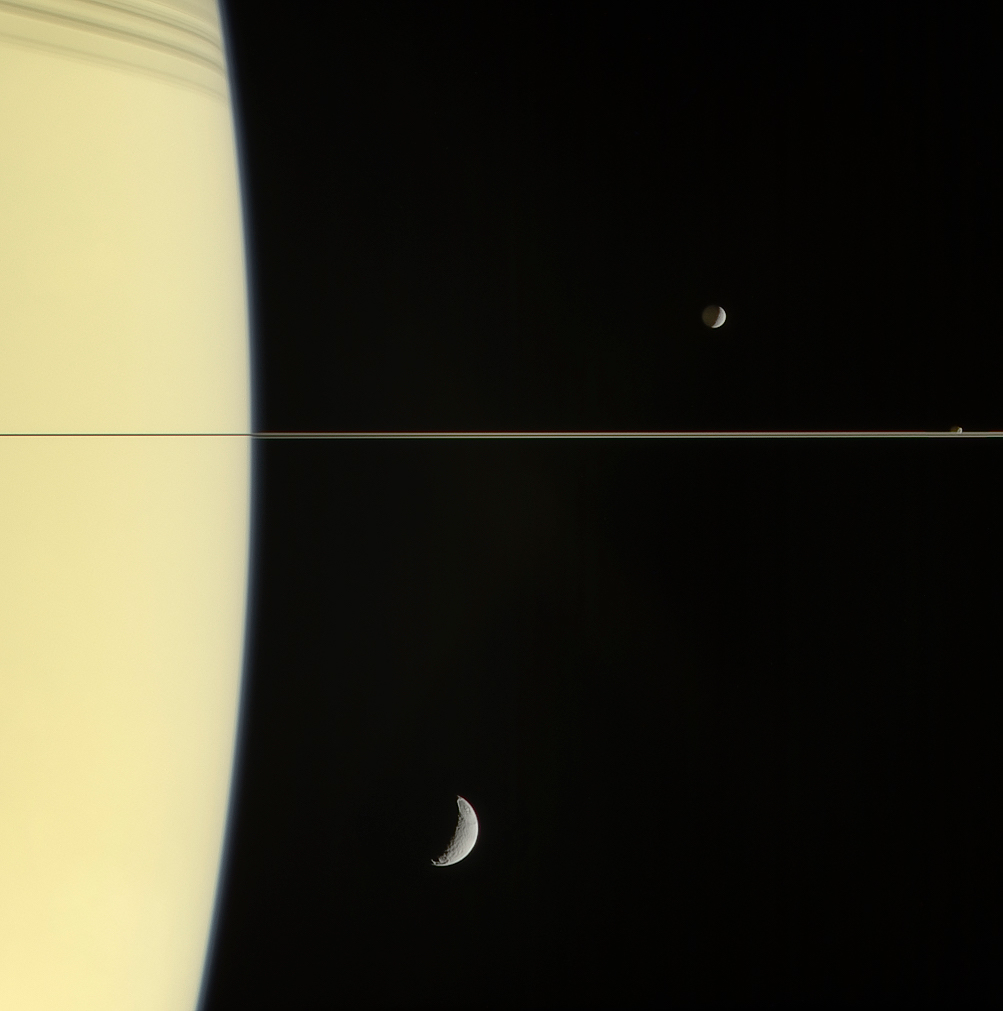 Saturn, its rings, Mimas, Janus and Tethys