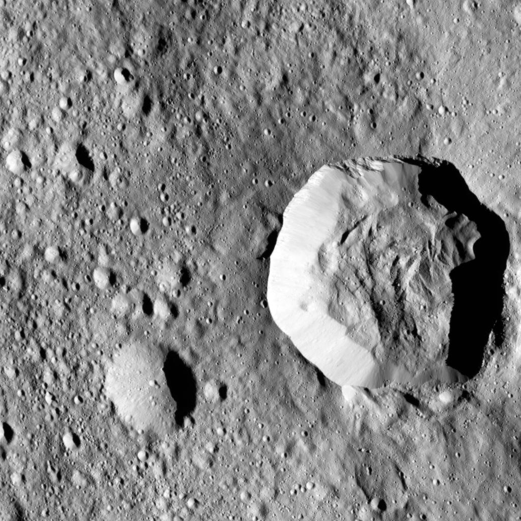 Ceres' surface shows evidence for different types of flows that indicate the presence of ice in the regolith (as described in PIA21471).