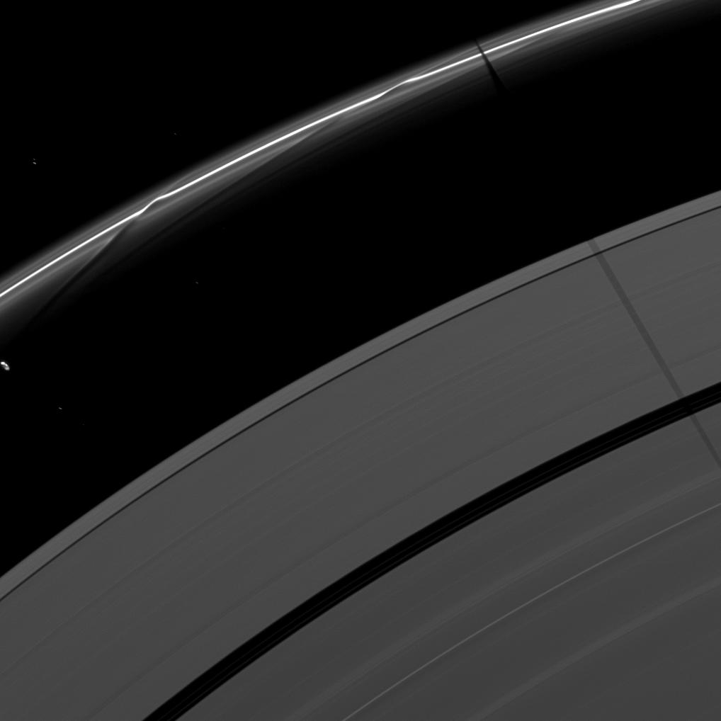 Janus casts a shadow on the F and A rings while Prometheus creates a streamer-channel in the thin F ring.