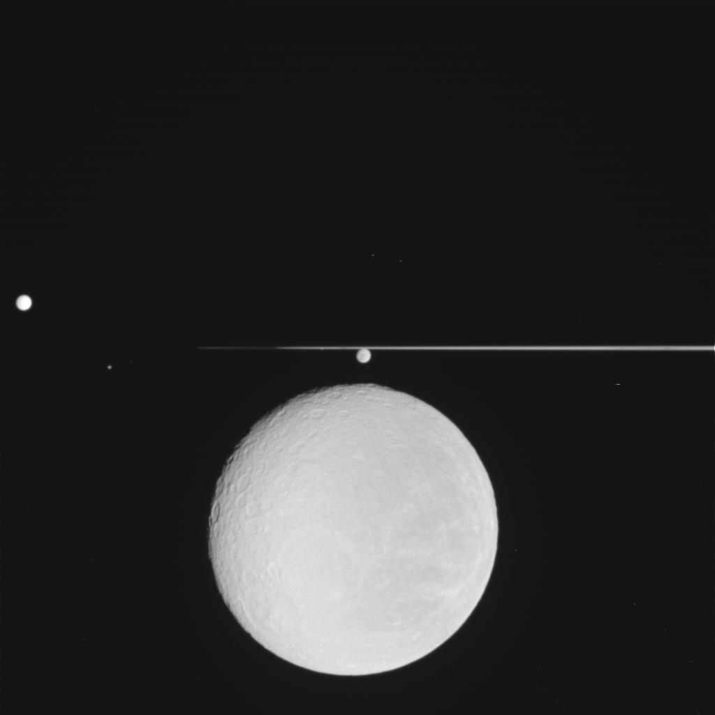 Rhea and Saturn's rings