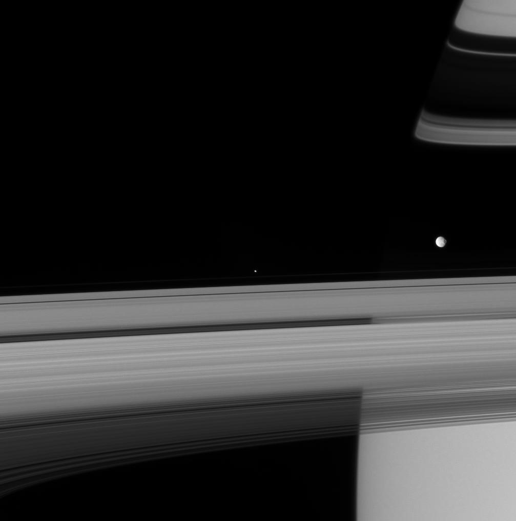 Saturn's rings, with Mimas and Pandora