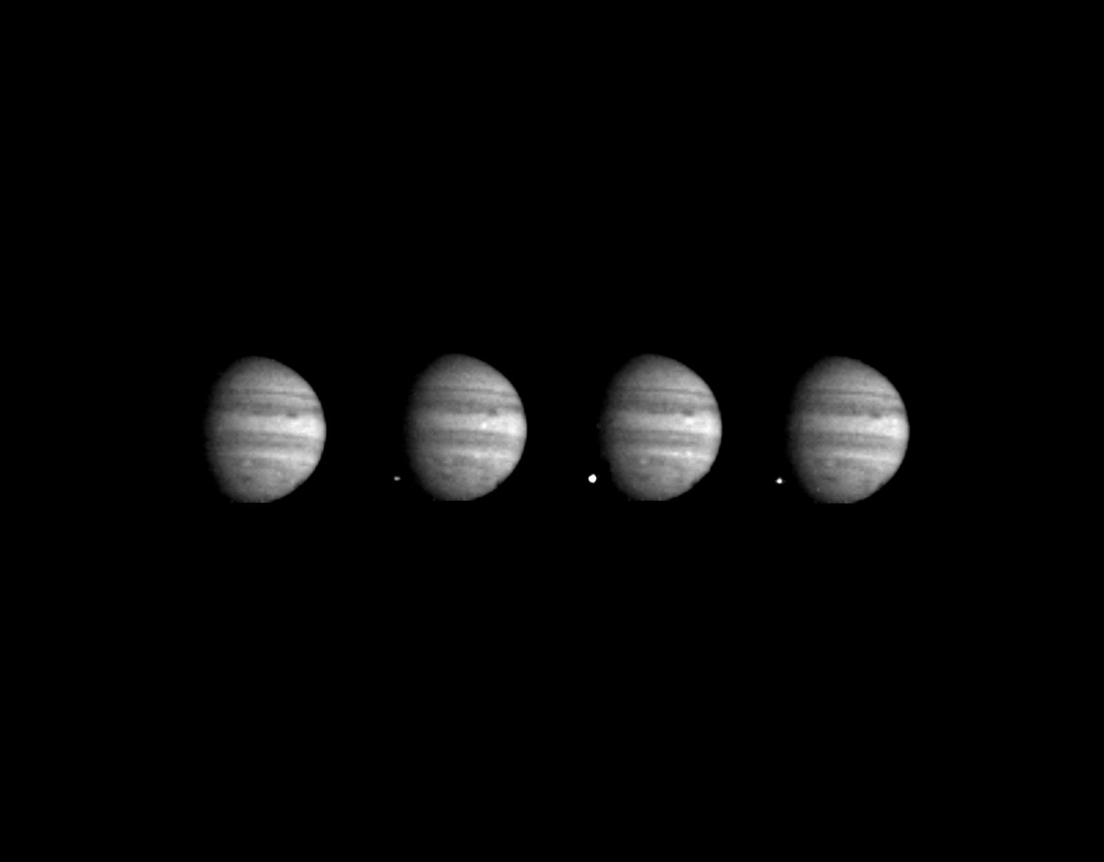 These four images of Jupiter and the luminous night-side impact of fragment W of Comet Shoemaker-Levy 9 were taken by the Galileo spacecraft on July 22, 1994. 