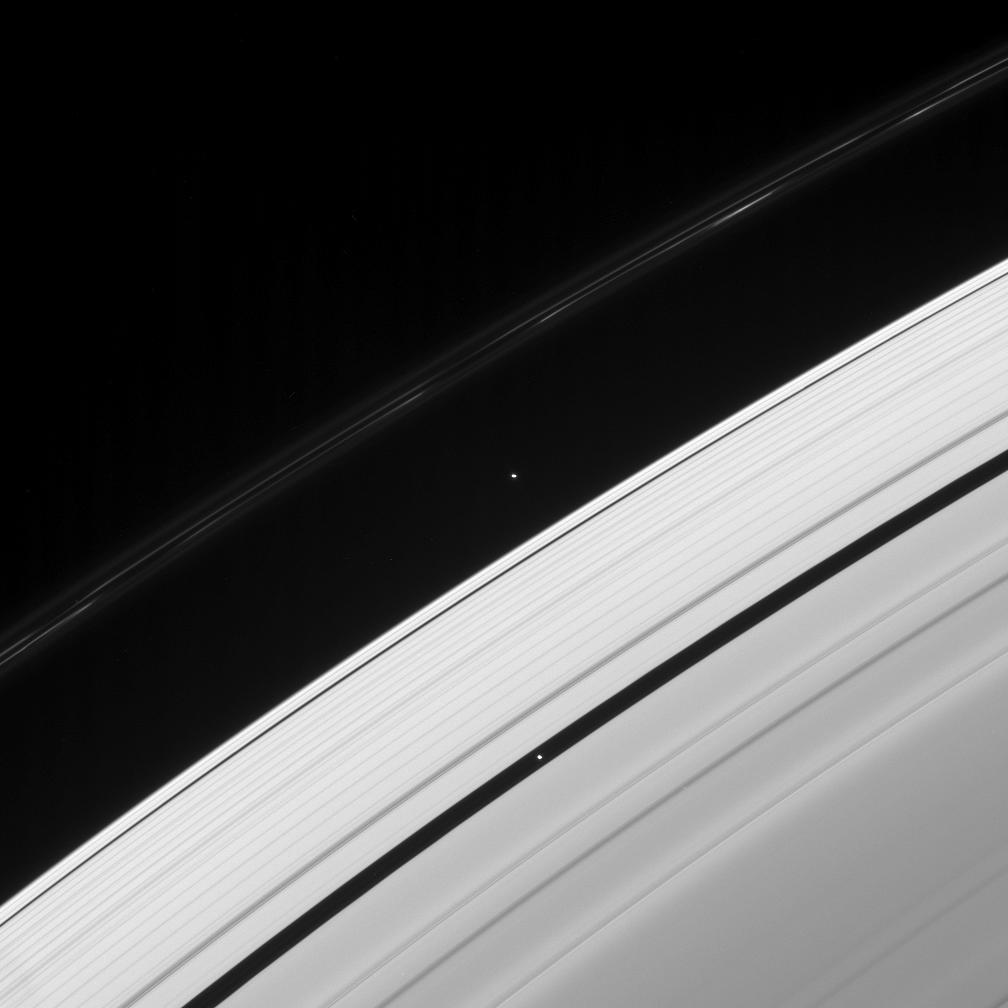 Saturn's rings and the moons Pan and Atlas