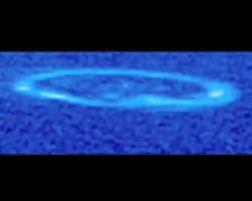 Saturn’s aurora is seen spinning above Saturn’s north pole over the course of most of a Saturn day