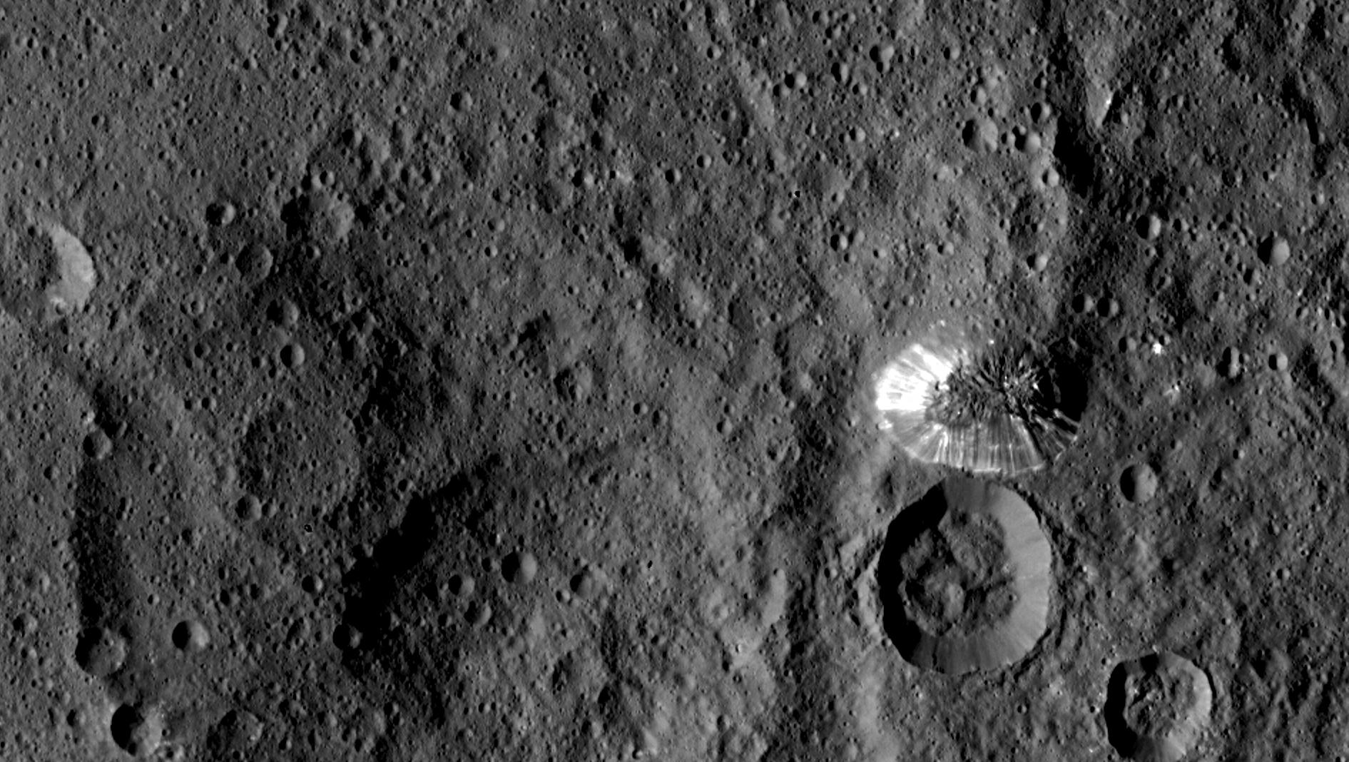 NASA's Dawn spacecraft spotted this tall, conical mountain on Ceres from a distance of 915 miles (1,470 kilometers).