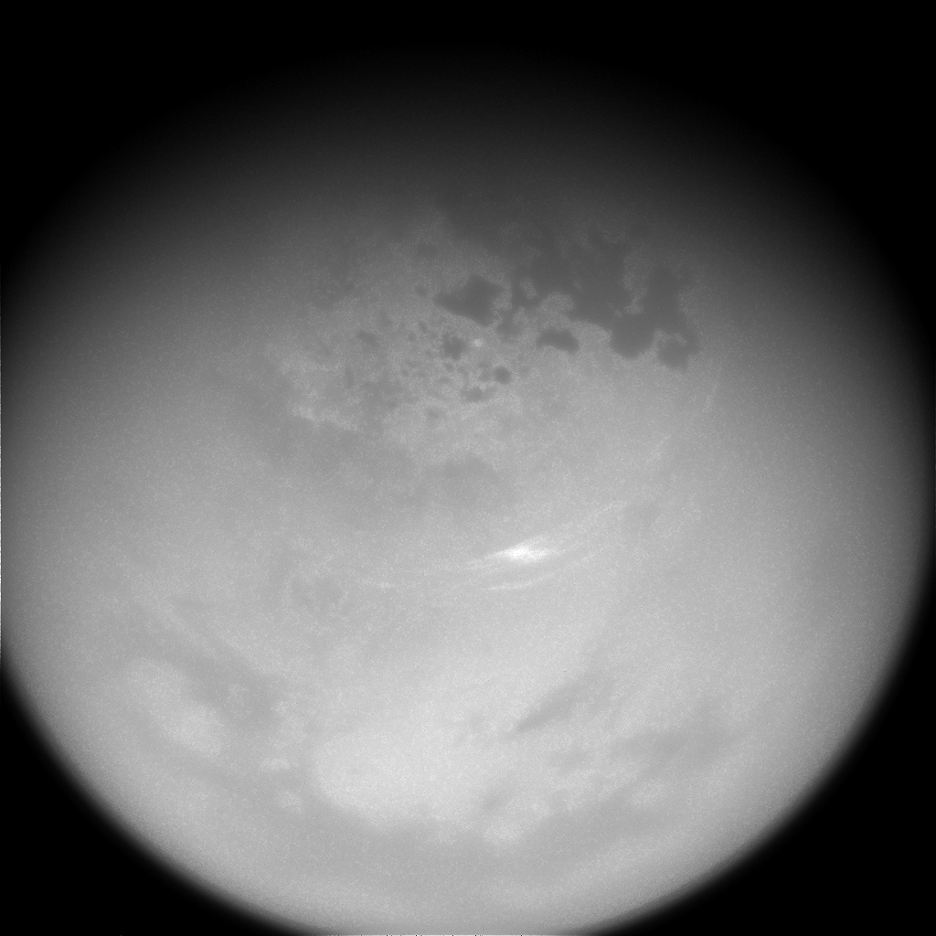 Black and white images of clouds seen on Titan from space.