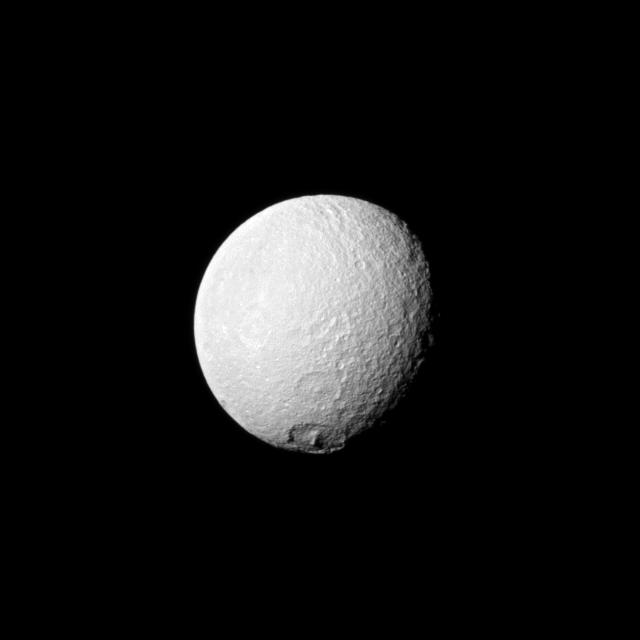 The large crater Melanthius near Tethys's south pole.