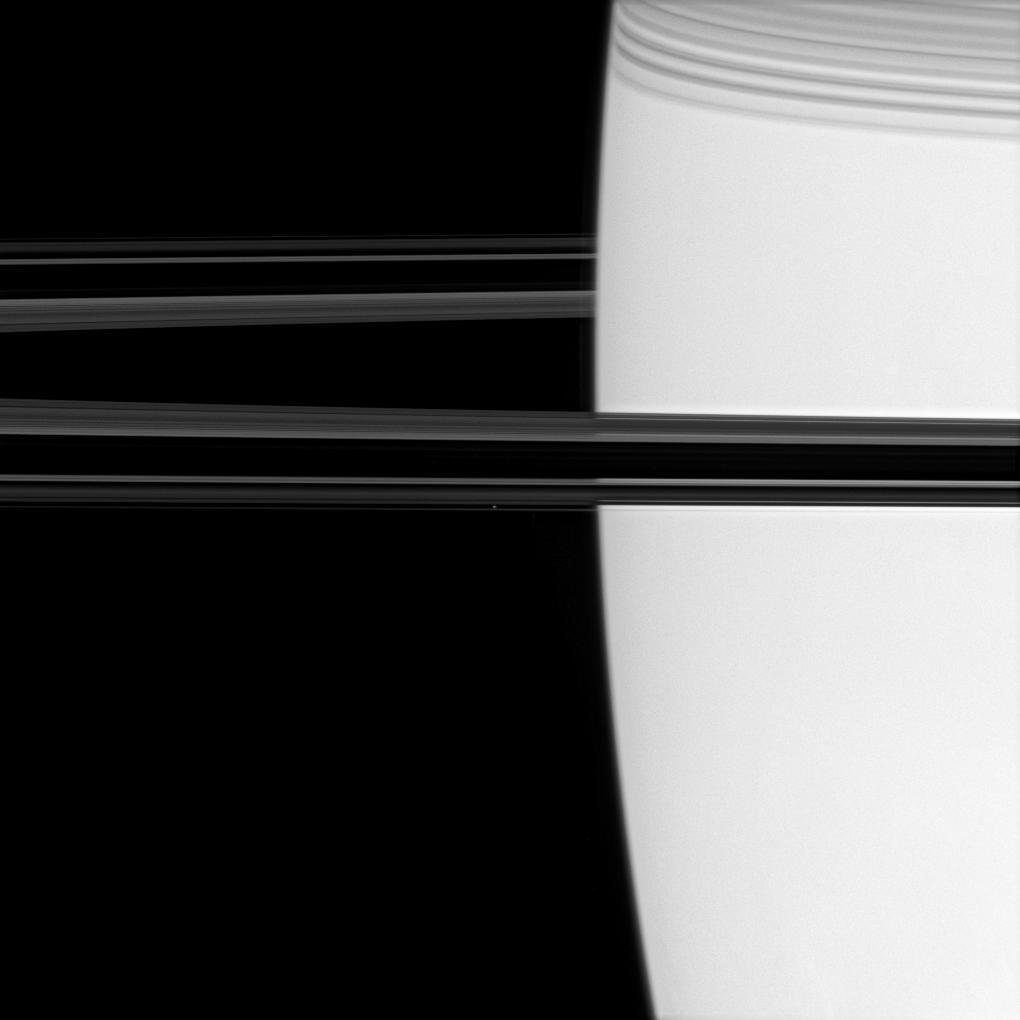 Saturn, its rings and the moon Atlas