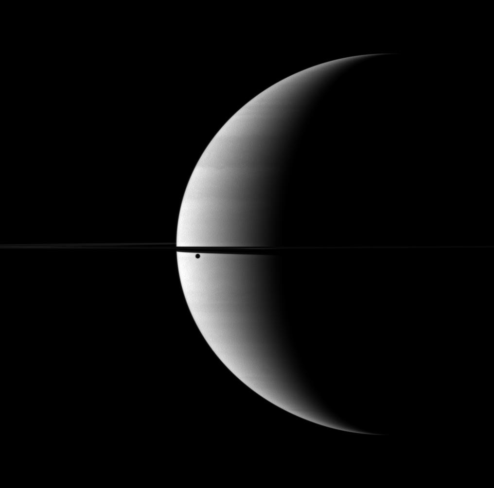 A crescent Saturn and Dione
