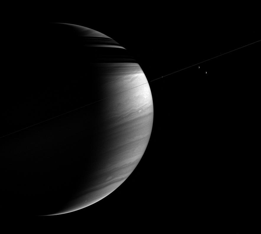 The tilted crescent of Saturn