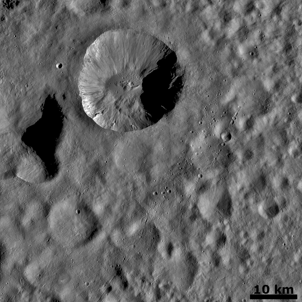 Ejecta from a Fresh Crater Covering Older Craters and Crater Chains