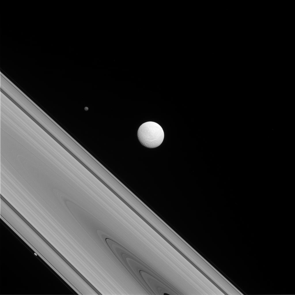 The Cassini spacecraft captures a rare family photo of three of Saturn's moons.