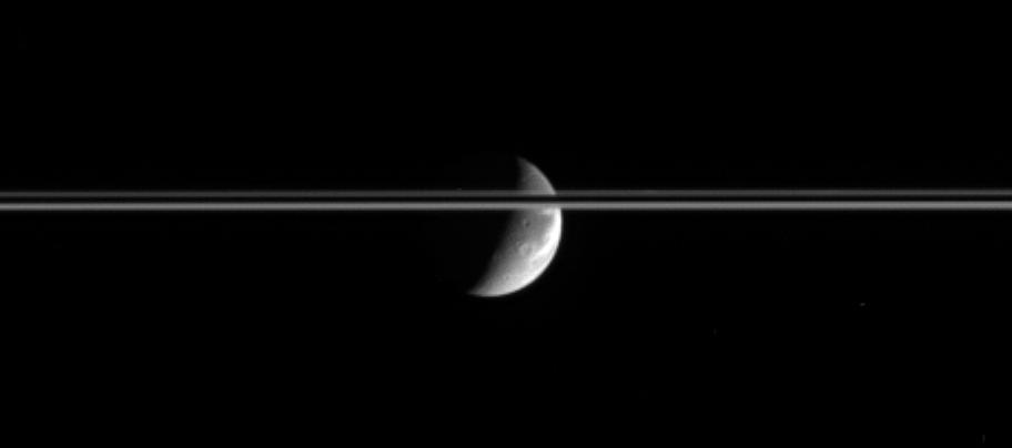 Dione and a portion of Saturn's rings