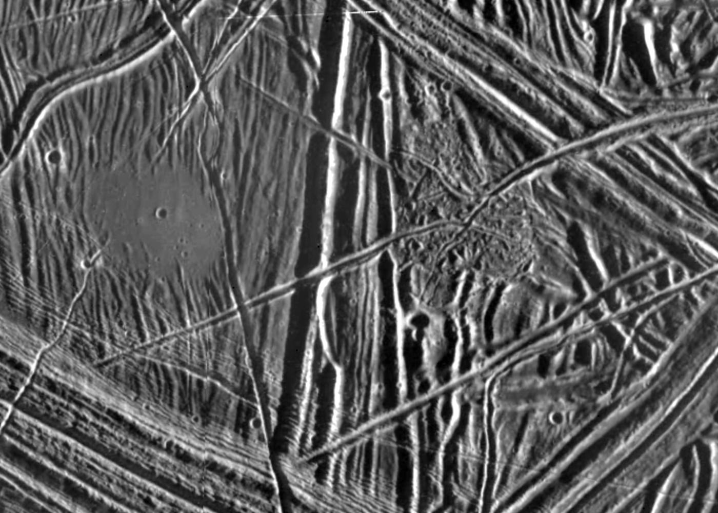 This close-up view of the icy surface of Europa, a moon of Jupiter, was obtained on December 20, 1996, by the Solid State Imaging system on board the Galileo spacecraft during its fourth orbit around Jupiter.