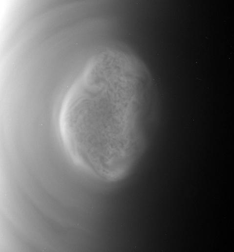 This movie captured by NASA'S Cassini spacecraft shows a south polar vortex, or a swirling mass of gas around the pole in the atmosphere, at Saturn’s moon Titan. The swirling mass appears to execute one full rotation in about nine hours – much faster than the moon's 16-day rotation period. The images were taken before and after a distant flyby of Titan on June 27, 2012.