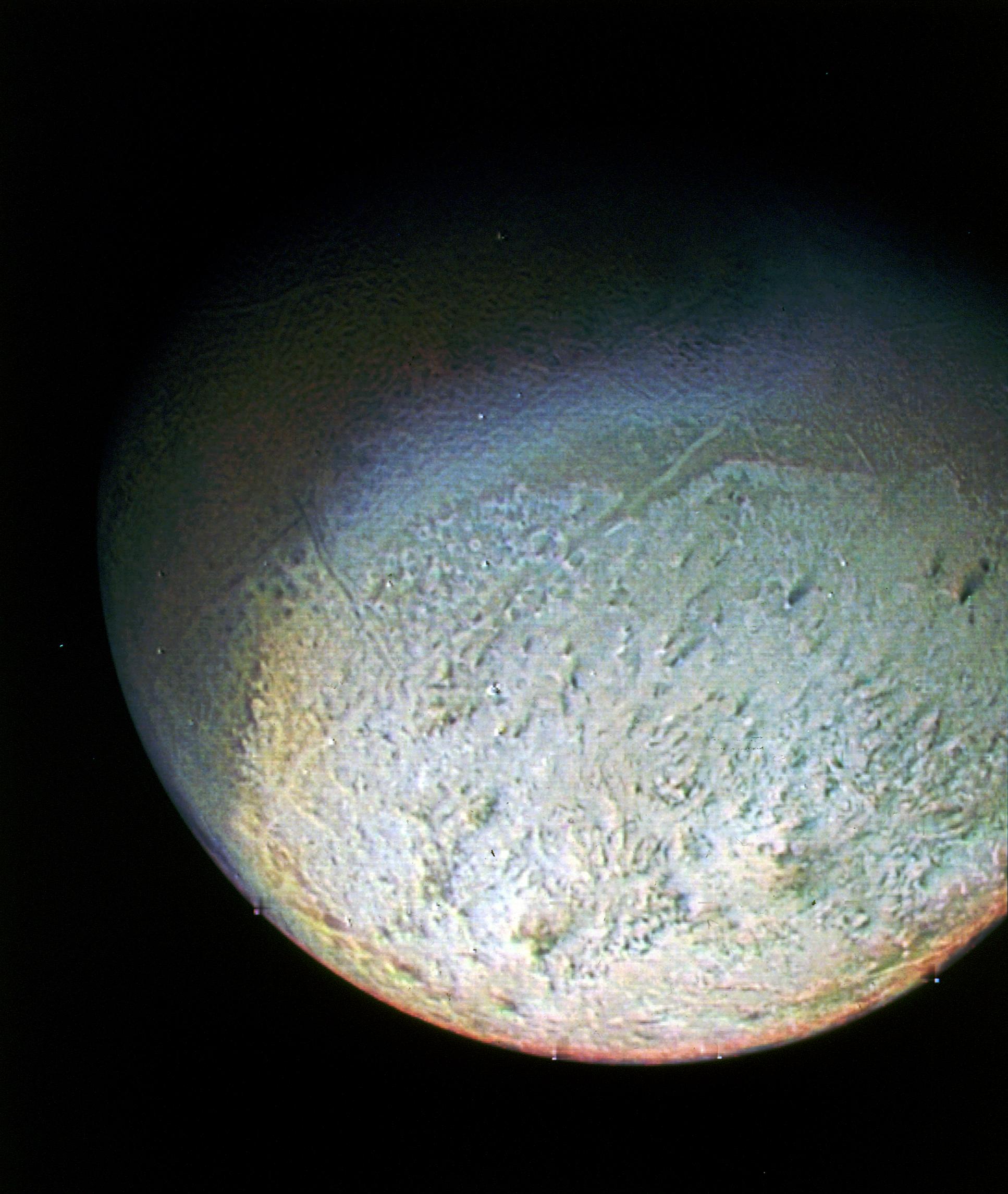 This color photo of Neptune's large satellite Triton was obtained on Aug. 24 1989 at a range of 530,000 kilometers (330,000 miles).