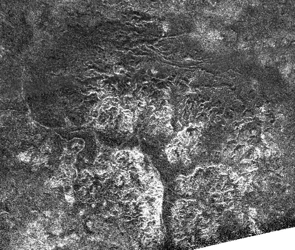 Complex and unique canyon systems appear to have been intricately carved into older terrain by the ample flow of liquid methane rivers on Saturn's moon Titan, as seen in this radar image