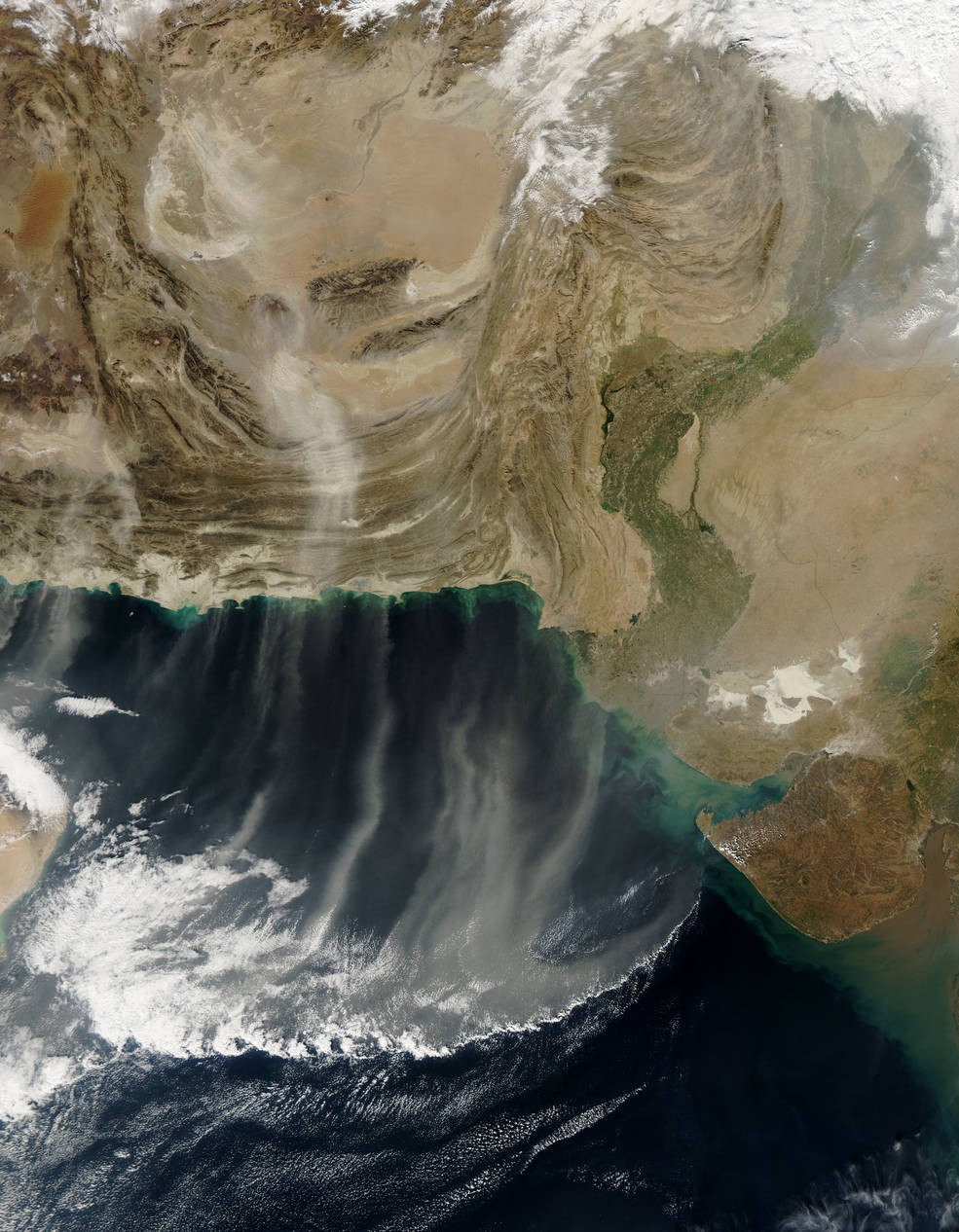 Satellite image of dust plumes blowing over the Arabian Sea