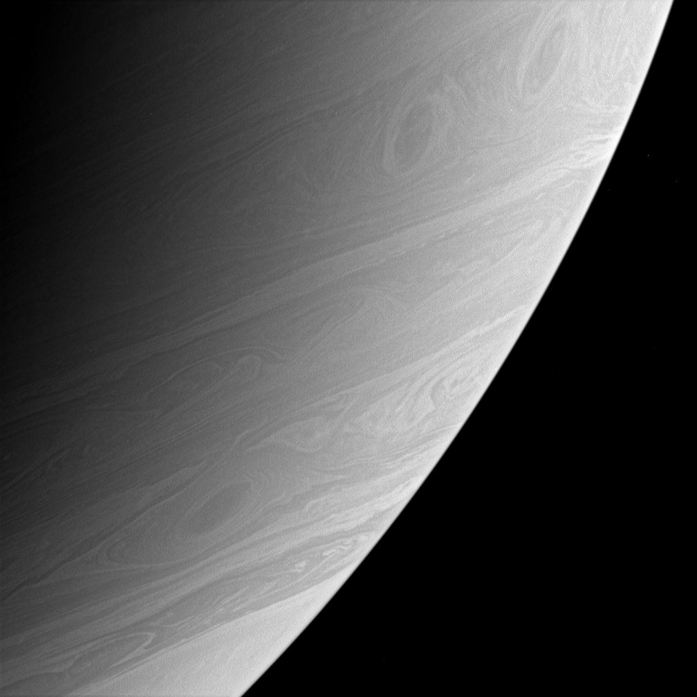 Three vortices on Saturn