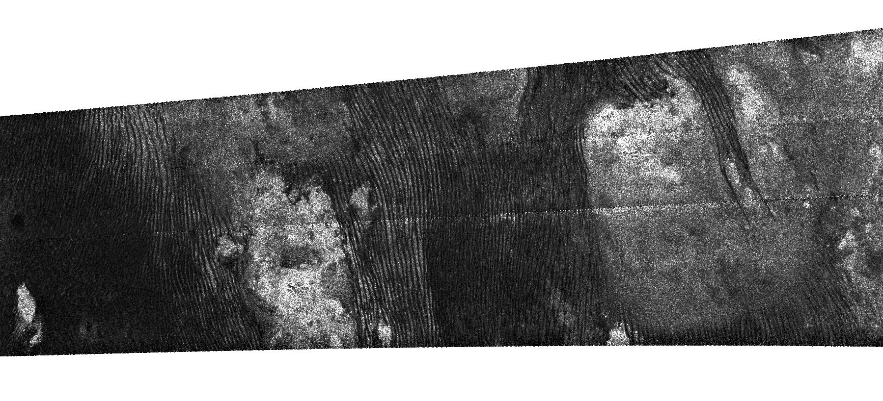 An intricate, fingerprint-like pattern of dunes is seen in this dramatic radar image of Saturn's moon Titan.