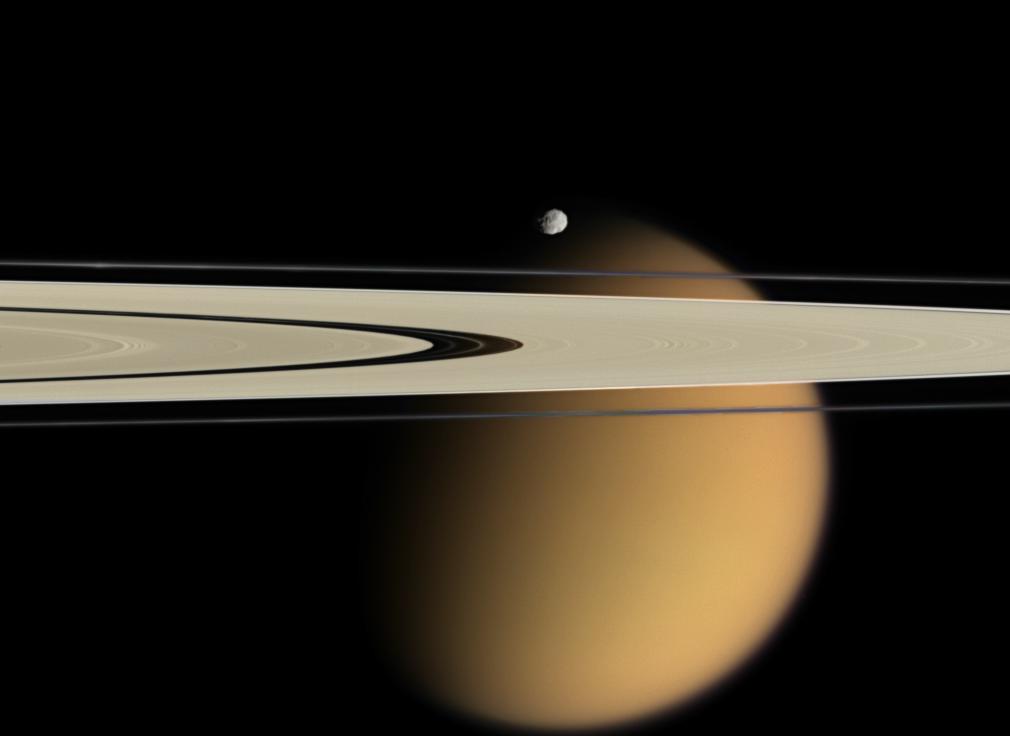 Titan and Epimetheus near Saturn's rings