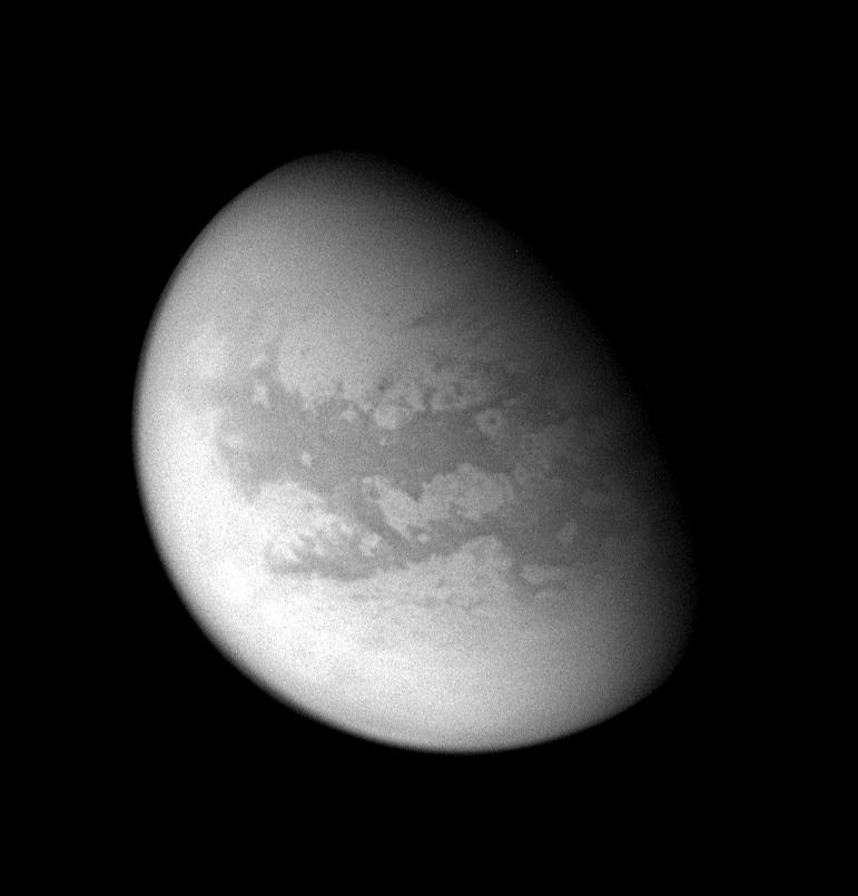 This processed image of Titan reveals mid-latitudes on the moon's Saturn-facing side