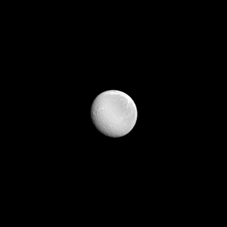 A nearly full Rhea shines in the sunlight in this recent Cassini image.