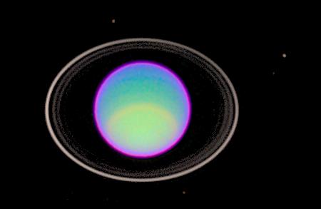 Hubble Space Telescope has peered deep into Uranus' atmosphere to see clear and hazy layers created by a mixture of gases. 