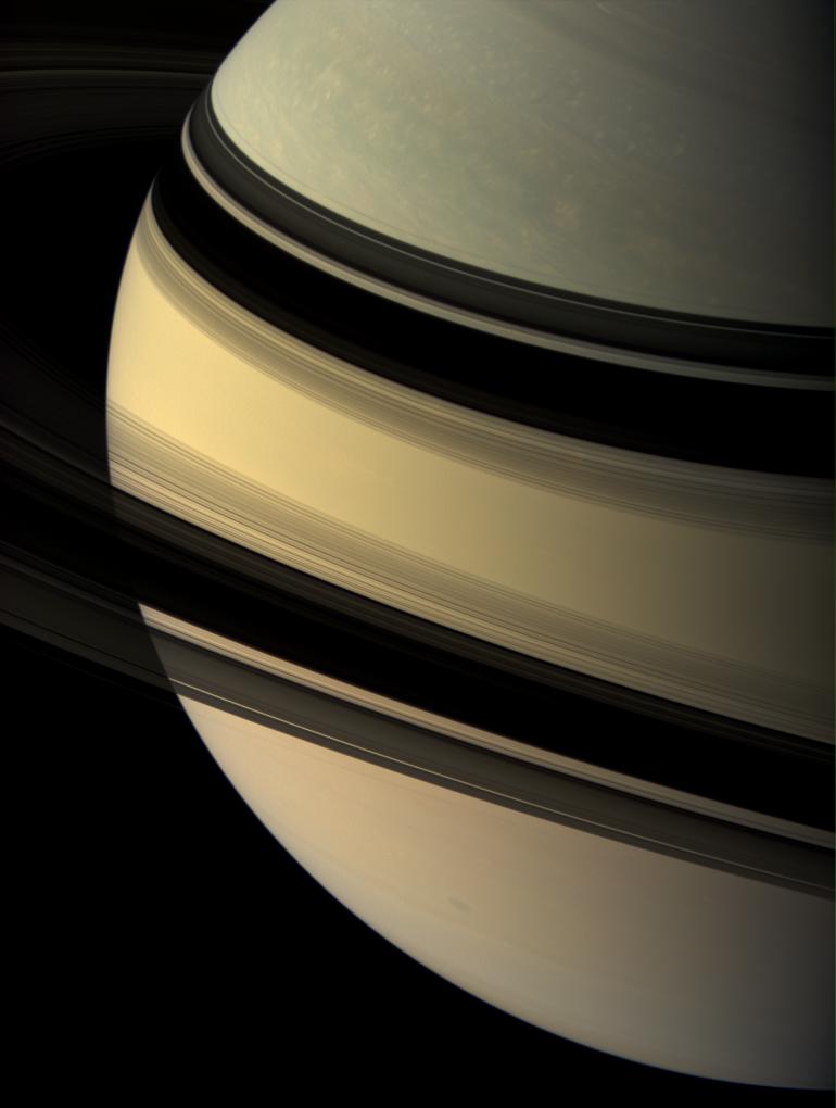 The shadow-draped face of Saturn.