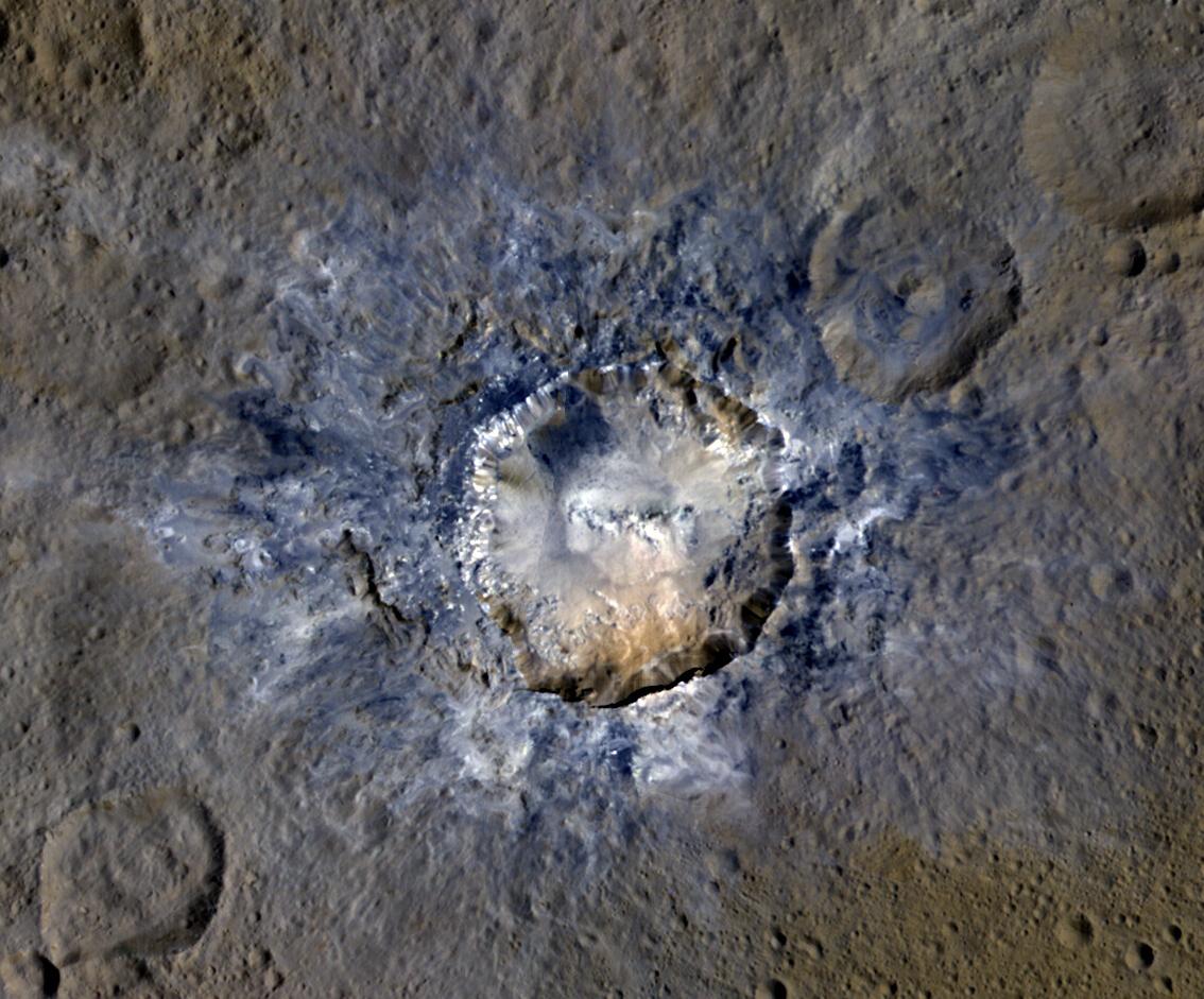 Ceres' Haulani Crater, with a diameter of 21 miles (34 kilometers), shows evidence of landslides from its crater rim.