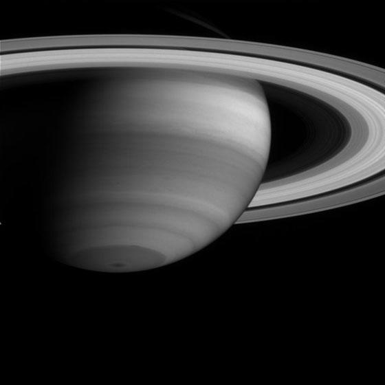 Saturn's Atmosphere and Rings