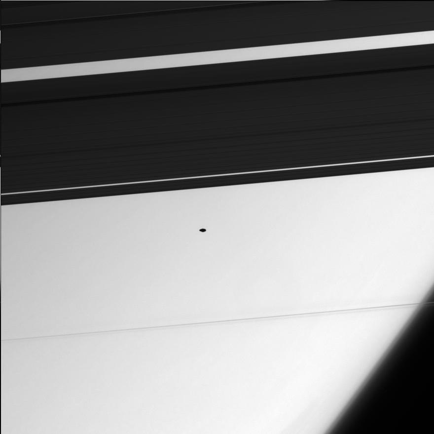 this is a narrow-angle camera image of the moon Atlas and Saturn's F ring