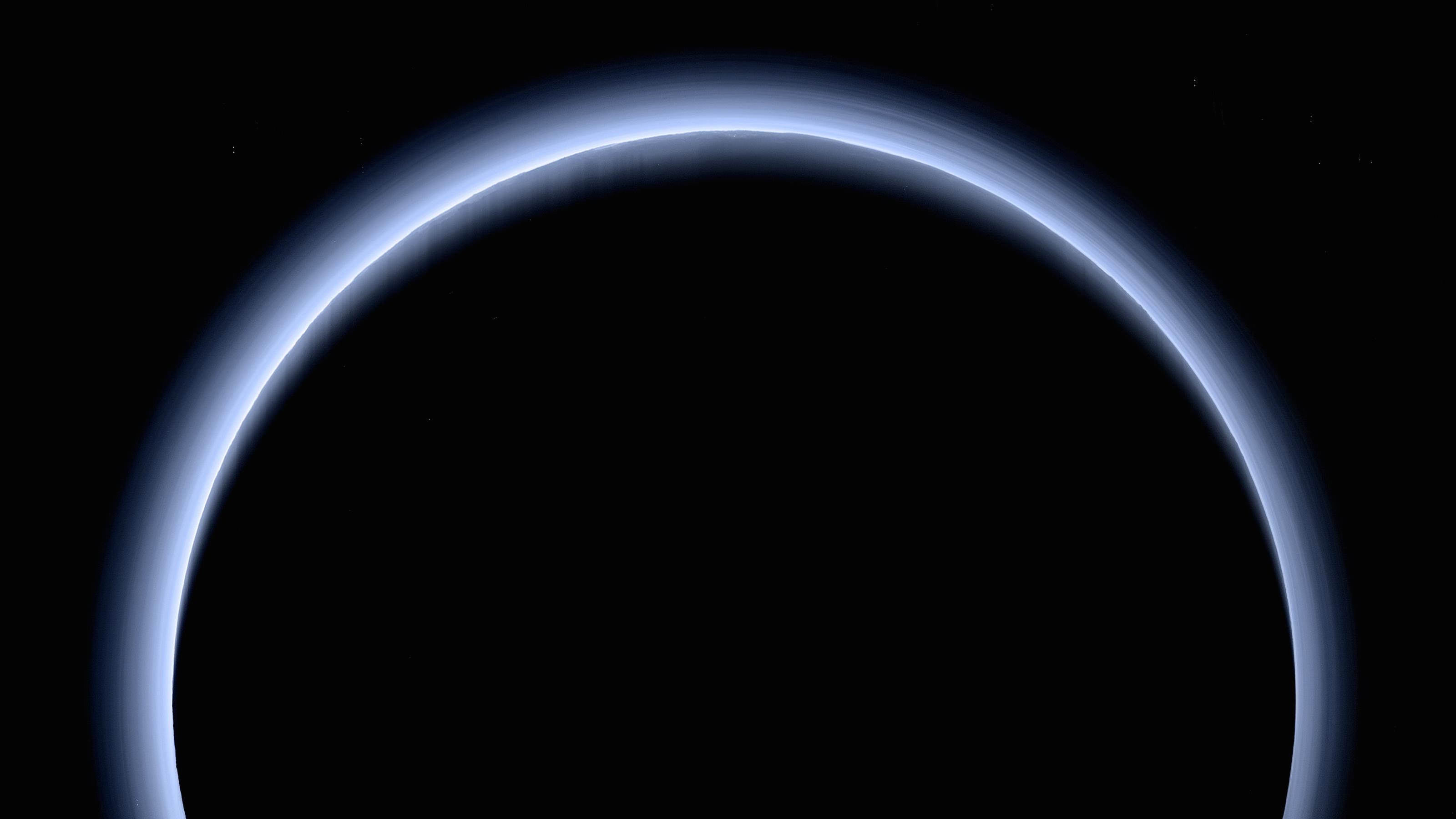 This is the highest-resolution color departure shot of Pluto's receding crescent from NASA's New Horizons spacecraft, taken when the spacecraft was 120,000 miles (200,000 kilometers) away from Pluto.