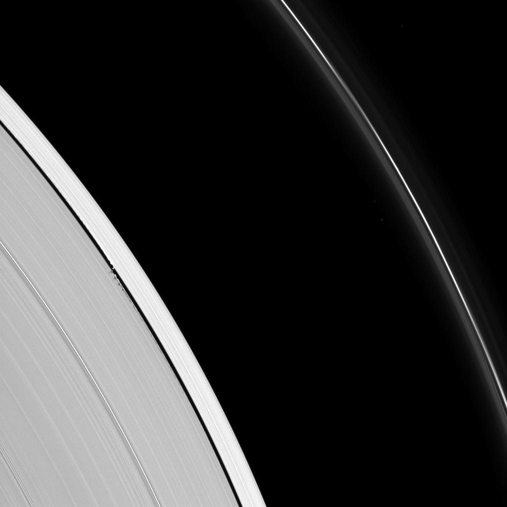 Tiny Daphnis appears as a bright dot in the Keeler Gap on Saturn's rings