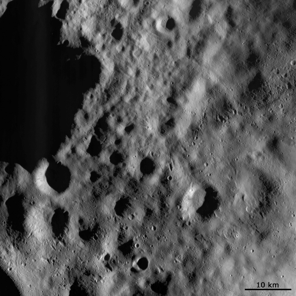 Mantled Surface of Vesta with Secondaries