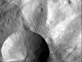 Asteroid Vesta: Layered Young Crater