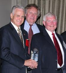 Ken Atkins, Tom Duxbury and Joe Vellinga accepting the Aviation Week and Space Technology Award