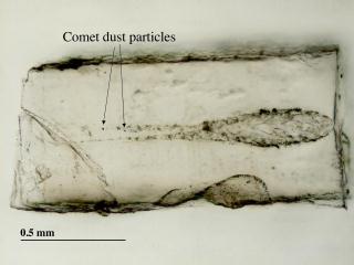 Aerogel slice removed with an ultrasonic blade, showing particle tracks