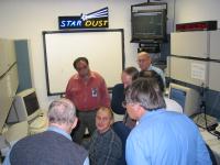 Stardust team waits for data to arrive from the Stardust spacecraft in the Mission Operations Room