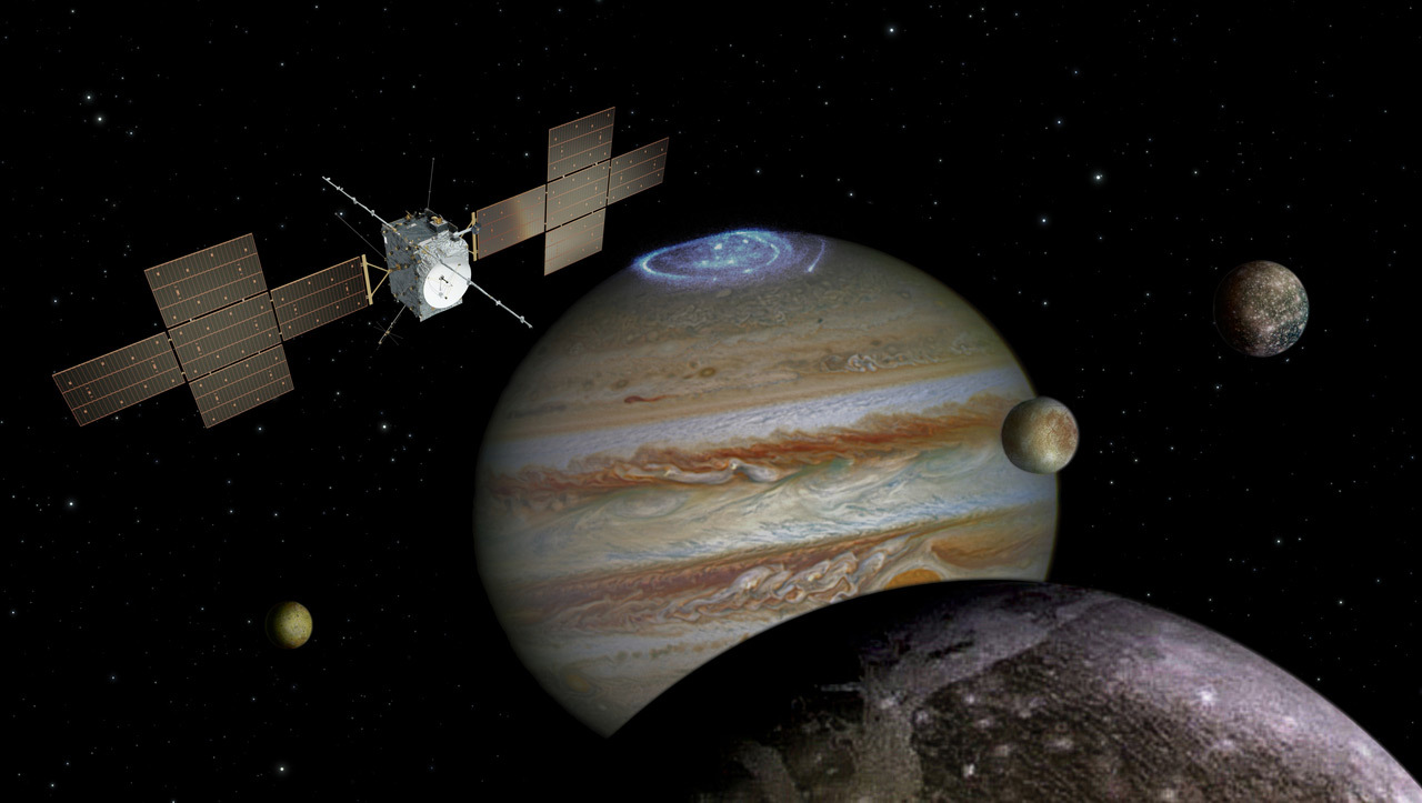 Illustration of spacecraft at Jupiter with four moons visible.