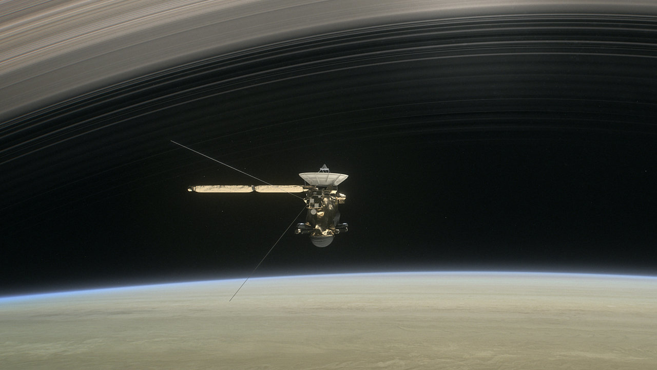Artist's concept of Cassini diving between Saturn and its innermost ring.