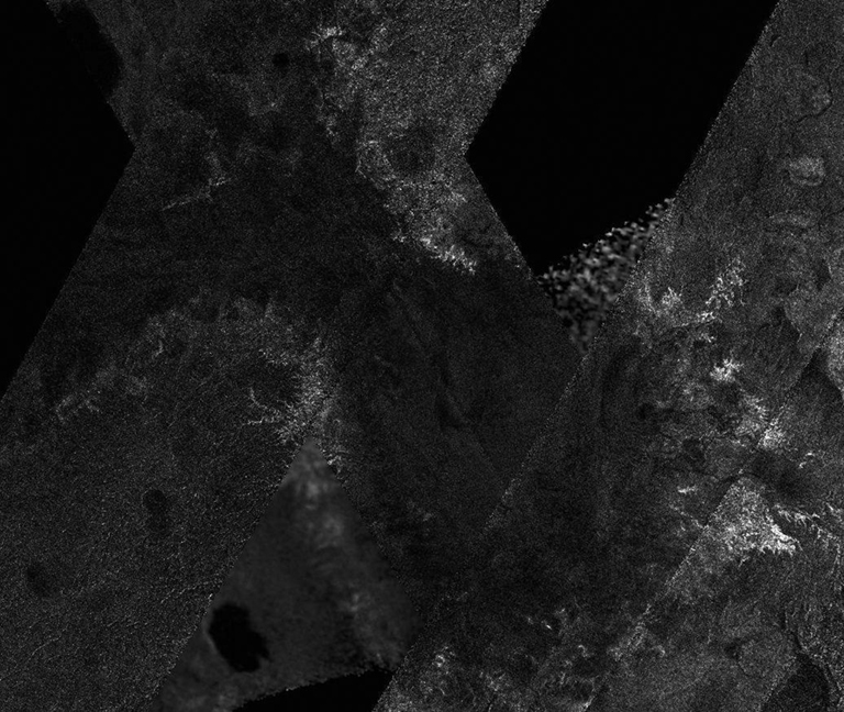 This mosaic of image swaths from Cassini's Titan Radar Mapper, taken with the synthetic-aperture radar (SAR), features a large dark region several hundred kilometers across that differs in several significant ways from potential lakes observed on Titan. The mosaic is near the south pole, centered near 82 degrees south, 205 degrees west. It includes data from Titan passes T39, T55, T57, T58, and T59, collected between December 2007 and July 2009.