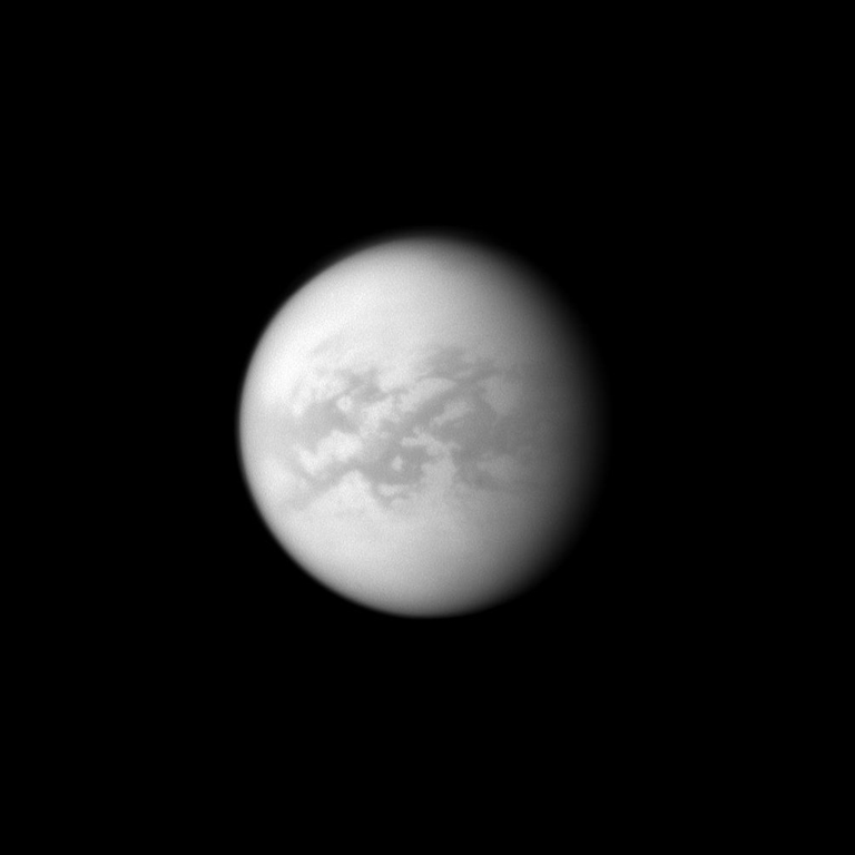 The Cassini spacecraft looks toward the dark Senkyo region on Saturn's moon Titan. This image was taken April 8, 2010.