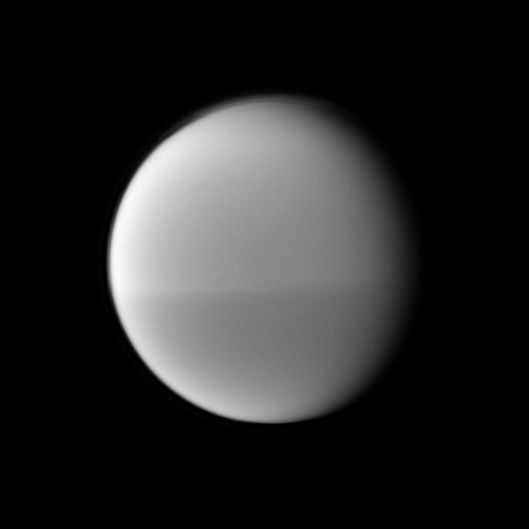 The Cassini spacecraft examine Titan's dark and light seasonal hemispheric dichotomy as it images the moon with a filter sensitive to near-infrared light. The image was taken May 22, 2010.