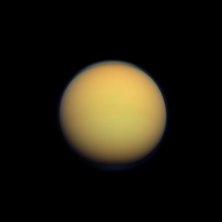 Titan's atmosphere makes Saturn's largest moon look like a fuzzy orange ball in this natural color view from the Cassini spacecraft.
Images taken using red, green and blue spectral filters were combined to create this natural color view. The images were obtained with the Cassini spacecraft wide-angle camera on Jan. 30, 2012.