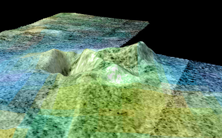 Still frame from a movie based on data from NASA’s Cassini spacecraft and shows a flyover of an area of Saturn’s moon Titan known as Sotra Facula. Scientists believe Sotra is the best case for an ice volcano -- or cryovolcano -- region on Titan.