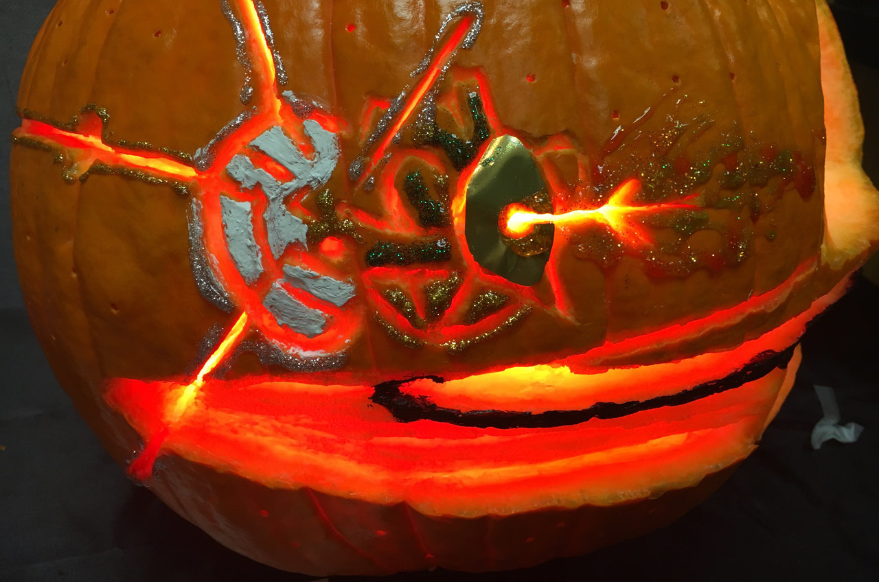 Cassini spacecraft carved into pumpkin.