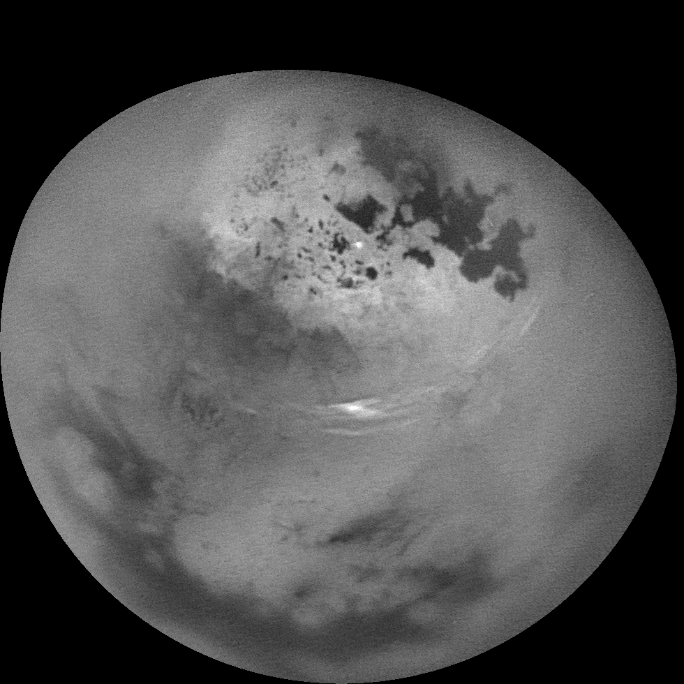 Black and white animated GIF showing clouds moving on Saturn's moon Titan.