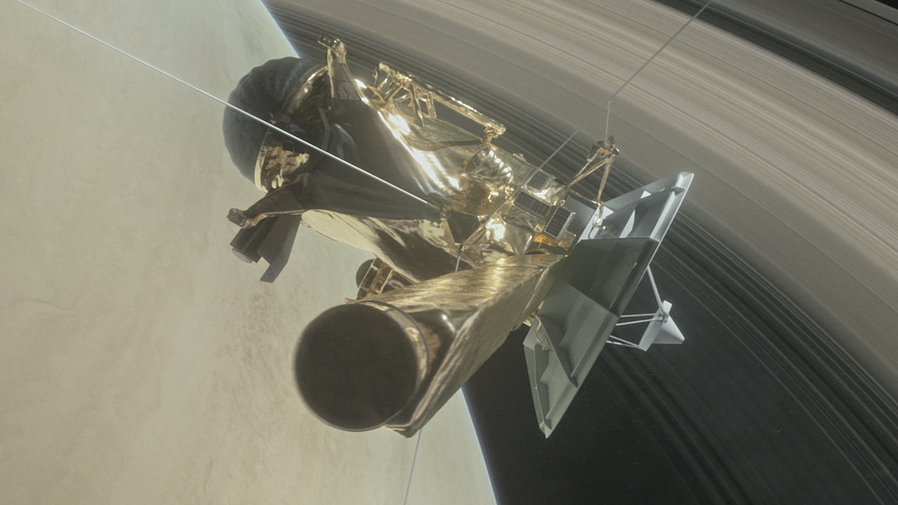 Artist's concept of Cassini diving into the gap between Saturn and its innermost ring.