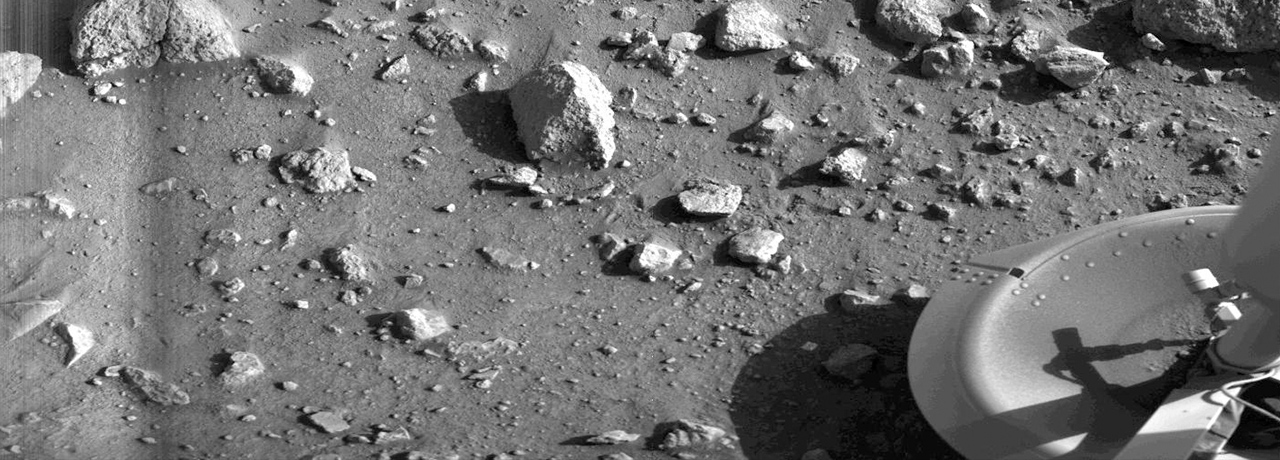 This is the first photograph ever taken on the surface of the planet Mars. It was obtained by Viking 1 just minutes after the spacecraft landed successfully early on July 20, 1976.